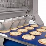 Integrating automation in the production of baked goods - Topping Applicators